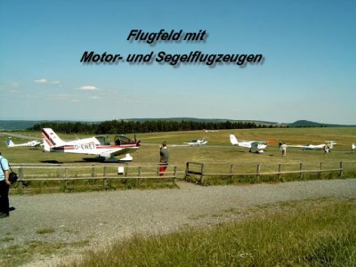 Airfield with take-off and landing areas for sailing and airplanes
