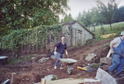 Earth-handling in the garden by diligent helpers